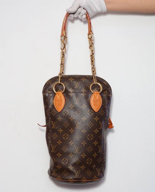 Louis Vuitton 2014 Pre-owned Monogram Punching Bag Baby Handbag